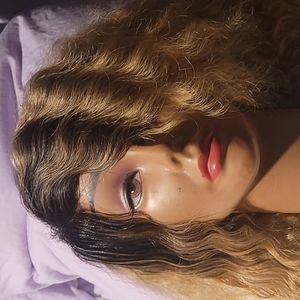 100% Remy Human Hair wig. 16" with layers.  body and bounce. I